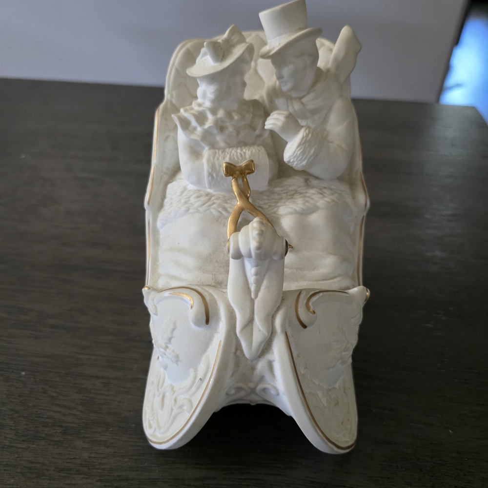 Lenox Victorian Sleigh Music Box, specifically the "Victorian Couple in Sleigh"